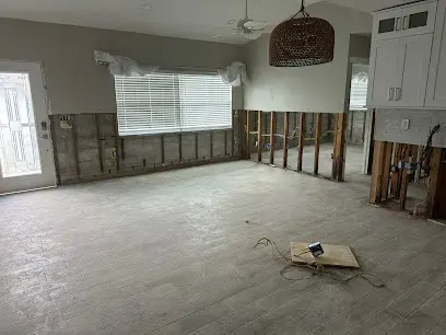 Great room with drywall cut away after Gulf coast flooding